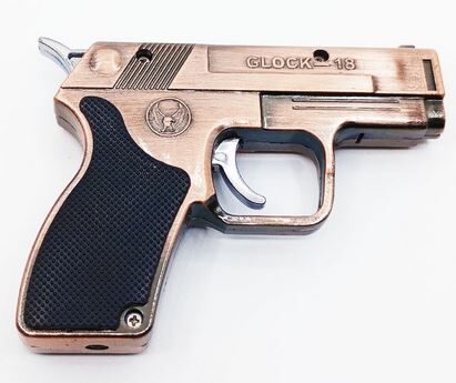 MECHERO SOPLETE PISTOLA GLOCK 18 BRONCE CON LUZ LÁSER
